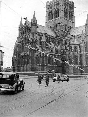 ST JOHN'S CHURCH WITH CARS & CYCLIST